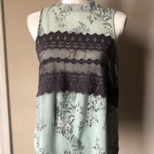 Green tank top with lace front and open back